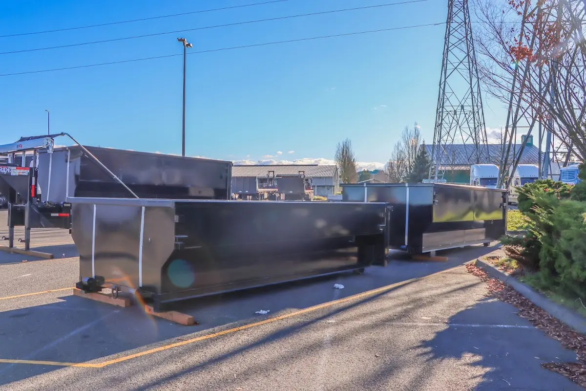 Roll-off dumpster ready for waste disposal at job site for Construction Dumpster Rental in Estherville